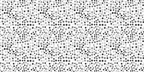 Grey dot texture pattern with a subtle, minimalist design. seamless background pattern