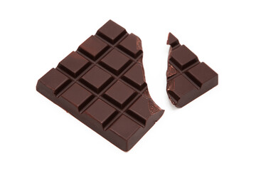 Broken bar of delicious dark chocolate isolated on white background. Classic organic natural black chocolate. Cocoa bean products.