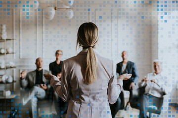 Businesswoman talking in a seminar