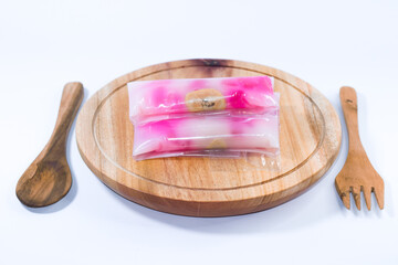 caktik manis cake, traditional Indonesian cakes placed on a wooden tray