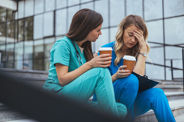 Concerned Healthcare Professionals Supporting Each Other on a Break