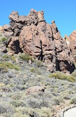 Scenic view of volcanic rock formations in desert during sunny day, Teide National Park, Tenerife