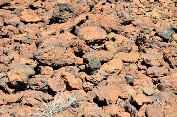 Scenic view of volcanic rock formations in desert during sunny day, Teide National Park, Tenerife