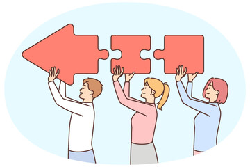 Motivated colleagues connect arrow pieces