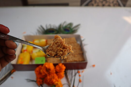 Cham cham and milkcake (kalakand), traditional Indian sweets, served together on a tray, perfect for festive celebrations and special occasions, adding sweetness to gatherings. Selective focus 