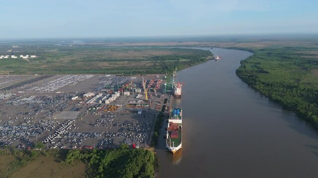 Aerial view of Parana River branch with international cargo port. Zarate, Buenos Aires, Argentina.