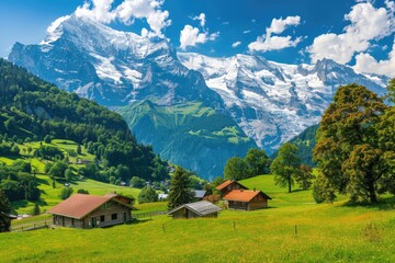 A view of a mountain range with houses and buildings in the foreground, set against a natural backdrop