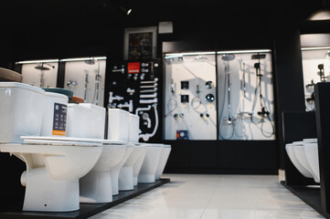 samples of modern sanitary ware for the toilet. new modern toilet in the plumbing store