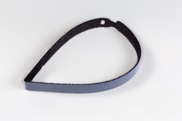 Reusable screed with hook-and-loop fastener for cables tying