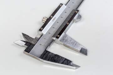 Vernier caliper head with metric scales, close-up selective focus