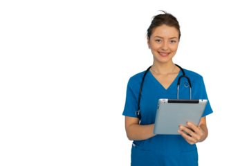 Young nurse in scrubs efficiently using a tablet for patient care