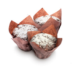 Tasty chocolate muffins with powdered sugar isolated on white