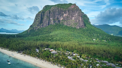 Le Morne tropical beach and famous kite, surf spot aerial panoramic view with palm trees and white...
