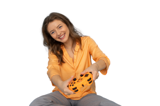 Enthusiastic female gamer immersed in her favorite video game