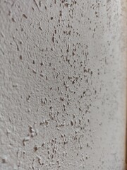 Lightly textured white interior wall