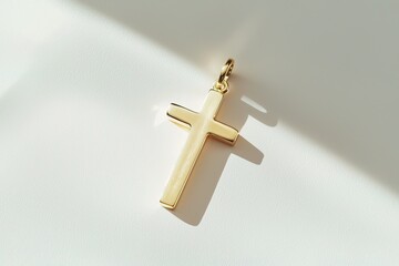close-up golden cross placed against a plain white background minimalist composition with soft natural lighting