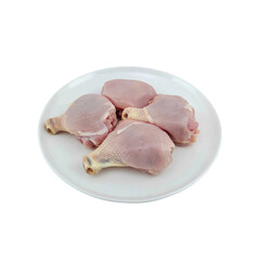 Raw Chicken Thighs on a White Plate