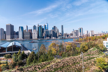 Brooklyn, New York, USA – October 28, 2024: View of lower Manhattan and the Brooklyn Bridge as...