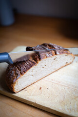 Close up of bread loaf on wooden board