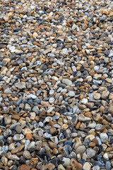Closeup of Smooth Pebbles on the Beach