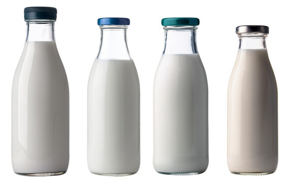 Four glass milk bottles on a white background, showcasing different types of milk.