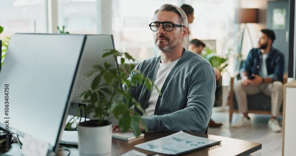 Poster Computer, glasses and web development with man software engineer in office for coding or programming. Desktop, reading and typing with mature employee in workplace for design or online research