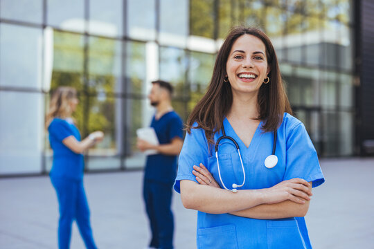 Confident Medical Professional Standing Outside Hospital Building