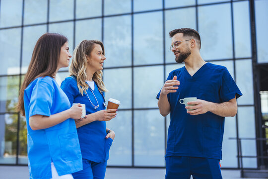 Healthcare Professionals Enjoying Coffee Break in Conversation