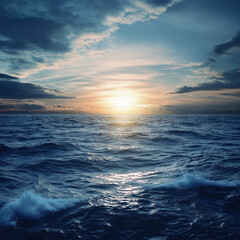 Obraz premium The vast ocean under a vibrant sunset, with gentle waves rolling and reflecting the colorful sky above.