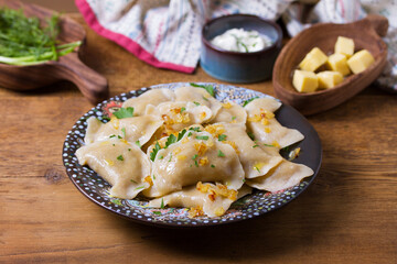 Dumplings filled with ground meat. Varenyky, vareniki, pierogi, pyrohy - dumplings with filling