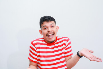 Fototapeta premium confused asian man while holding his smartphone