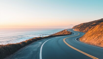 A winding coastal highway with cliffs and the ocean below, ample sky space for text, dramatic sunset, Scenic, Photography