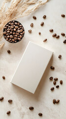 A minimalist blank white box rests on a light surface surrounded by coffee beans and a bowl of beans, evoking a serene atmosphere of coffee culture