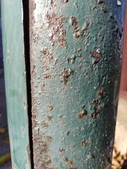 Corroded green painted surface