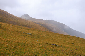 A mysterious atmosphere in the Swiss Alps! An extremely beautiful landscape in the autumn season.