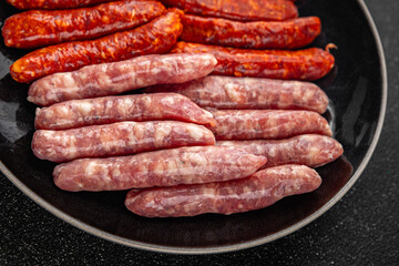 sausage raw meat beef, pork, chicken, lamb, dish fresh  gourmet food background on the table rustic food top view copy space