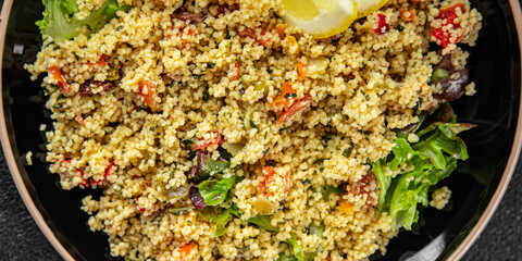 tabbouleh bulgur couscous with vegetables dish fresh delicious vegetarian and vegan food gourmet...