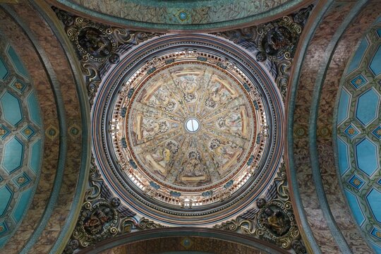 Low angle of the dome with frescoes on top of Catedral Metropolitana of Quito