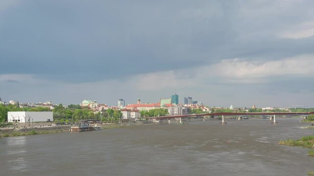 Warsaw Poland time lapse city skyline at Praga Footbridge and old town