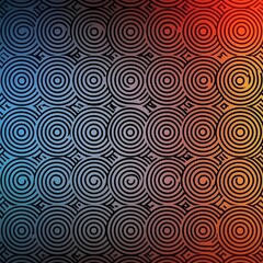 A vibrant, abstract pattern featuring intricate circular designs in a gradient of blue, orange, and red tones, creating a visually striking and modern aesthetic.