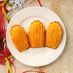 Madeleine, sweet biscuit dessert Christmas cookie delicious Christmas treat Fresh delicious gourmet food background on the table rustic food top view copy space