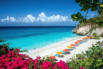 A tropical beach scene with bright blue water, white sand, and colorful beach umbrellas.