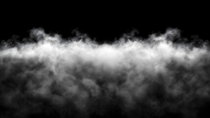 Dramatic fog swirling against a black background