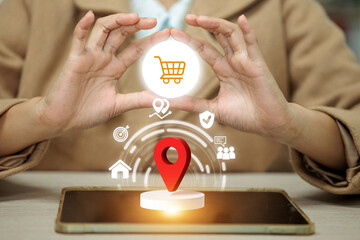 A woman is holding a tablet with a shopping cart on it