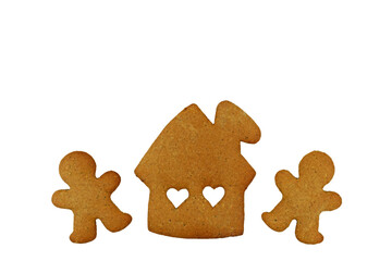 Gingerbread men and house isolated on white background. Romantic Christmas or winter concept, copy space for text