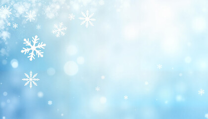 Winter background with falling snowflakes and a soft blue gradient