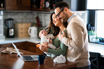 Parents with baby having video call online, conversation with relatives, communicating with friends