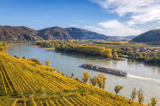 Autumn panorama of Wachau valley (Unesco world heritage site) with ships on Danube river near the Weissenkirchen village in Lower Austria, Austria