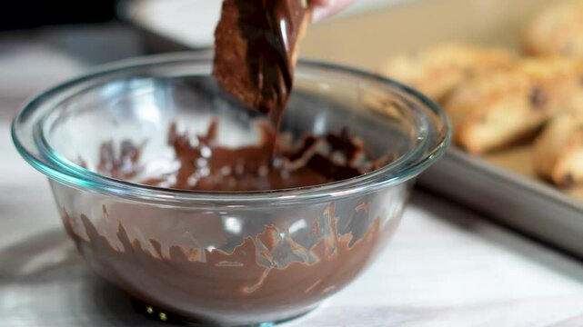  Freshly baked chocolate chip biscotti's for dunking in your favorite coffee. Homemade pastries dipped in chocolate for anytime of day but great with coffee.