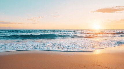 Obraz premium A serene sunset over the ocean with gentle waves lapping against the sandy shore under a colorful sky.
